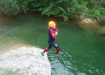 Canyoneering action in Sant Feliu